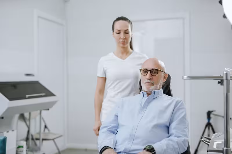 Book Your Microsuction Appointment In Ashford, And End The Discomfort Of Blocked Ears.: A doctor in a clinic Doctor in clinic for Book Your Microsuction Appointment In Ashford, And End The Discomfort Of Blocked Ears. - Trusted By Pat...