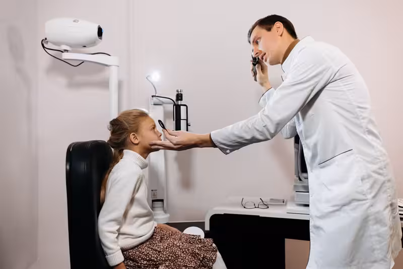 Edgware NW4: Arrival, Mobile Check-In and Clinic Access Guide: A doctor in a clinic Doctor in clinic for Edgware NW4: Arrival, Mobile Check-In and Clinic Access Guide - Edgware - Private Microsuction Ear Wax...